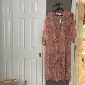 its a peachy light weight long coat.